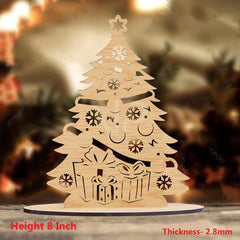 Wooden Christmas tree decoration with cut-out details on a blurred background