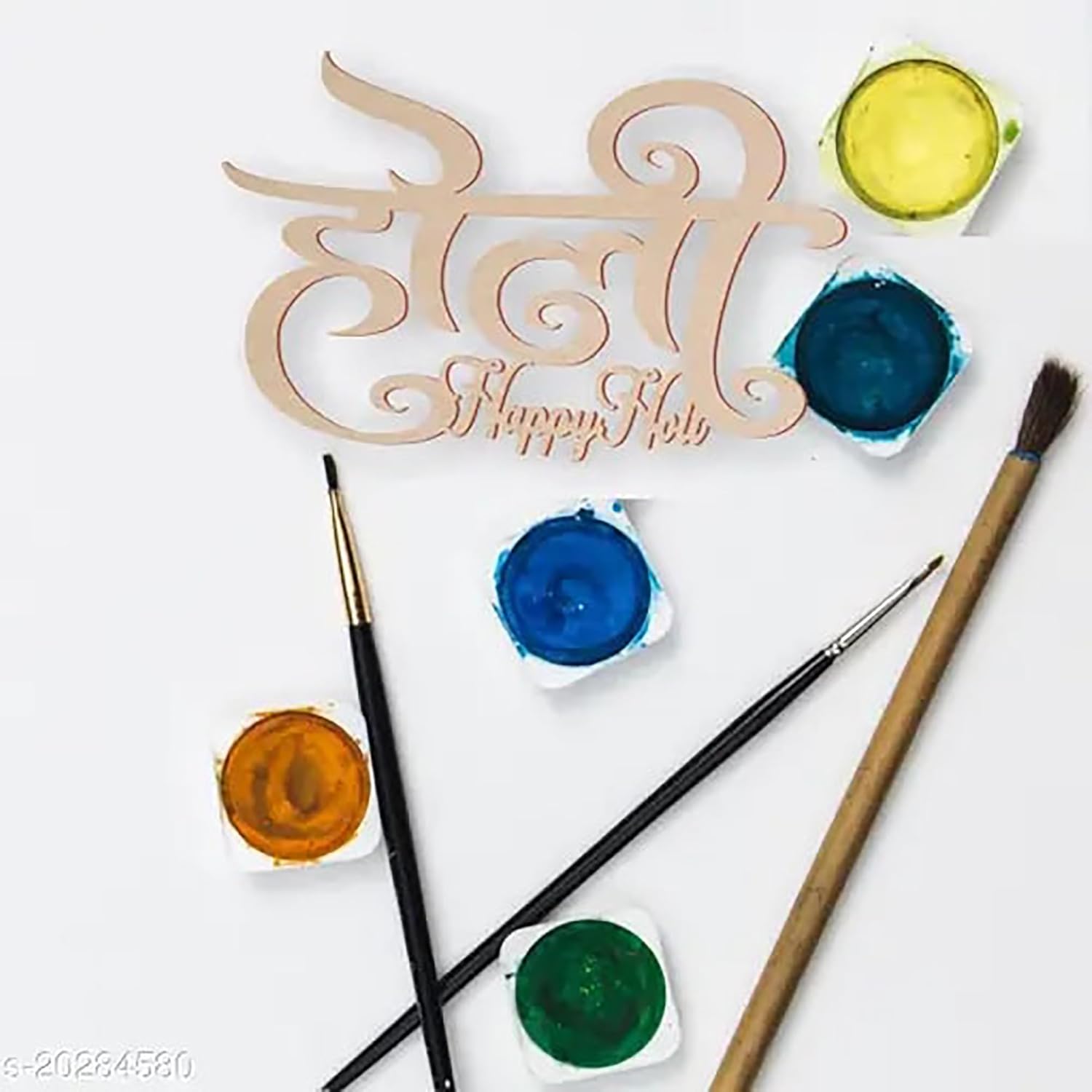 Decorative wooden nameplate with 'Happy Holi' text, paintbrushes, and colorful paint on a white background.