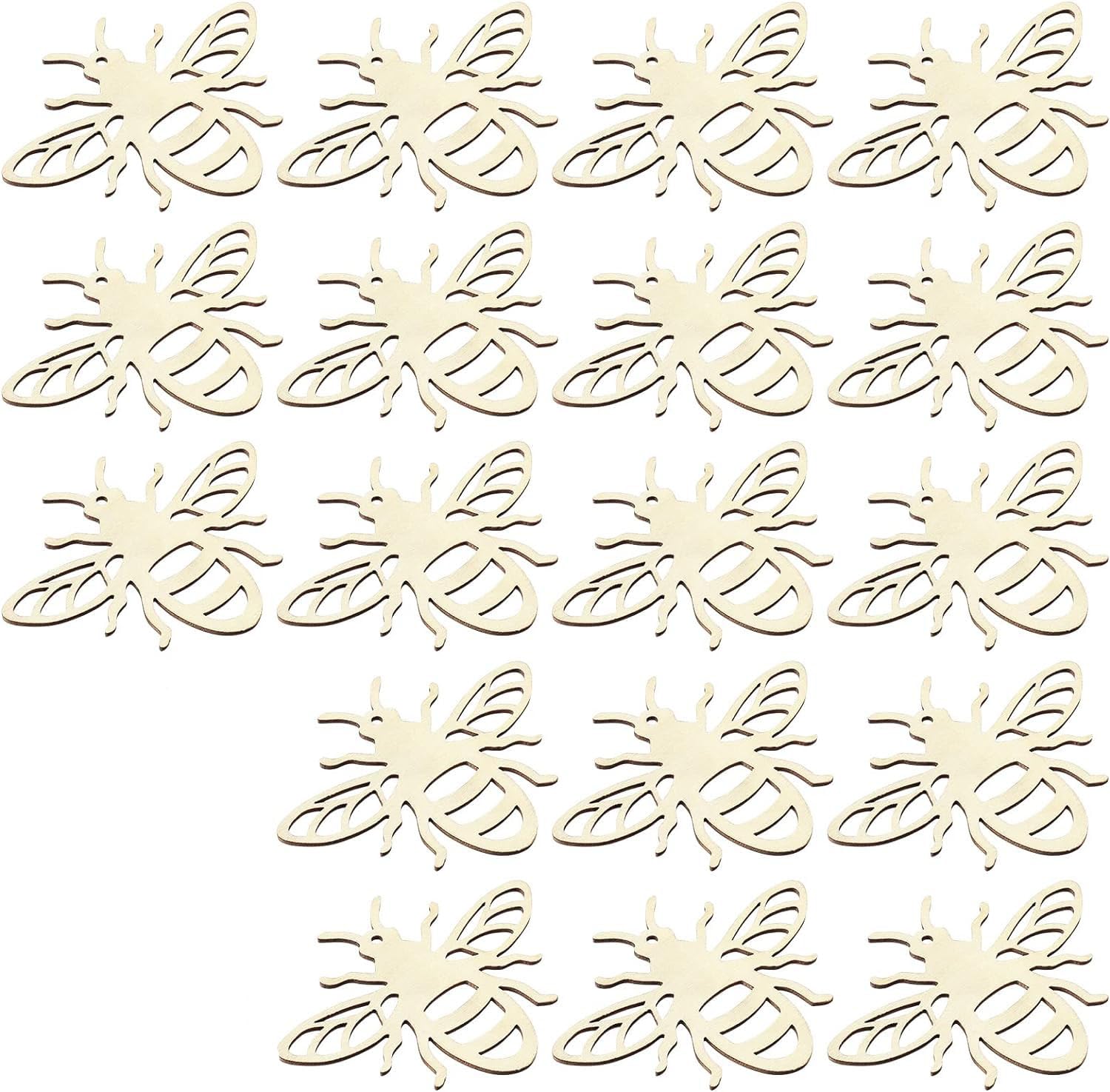 Pattern of gold bee-shaped cutouts on a white background