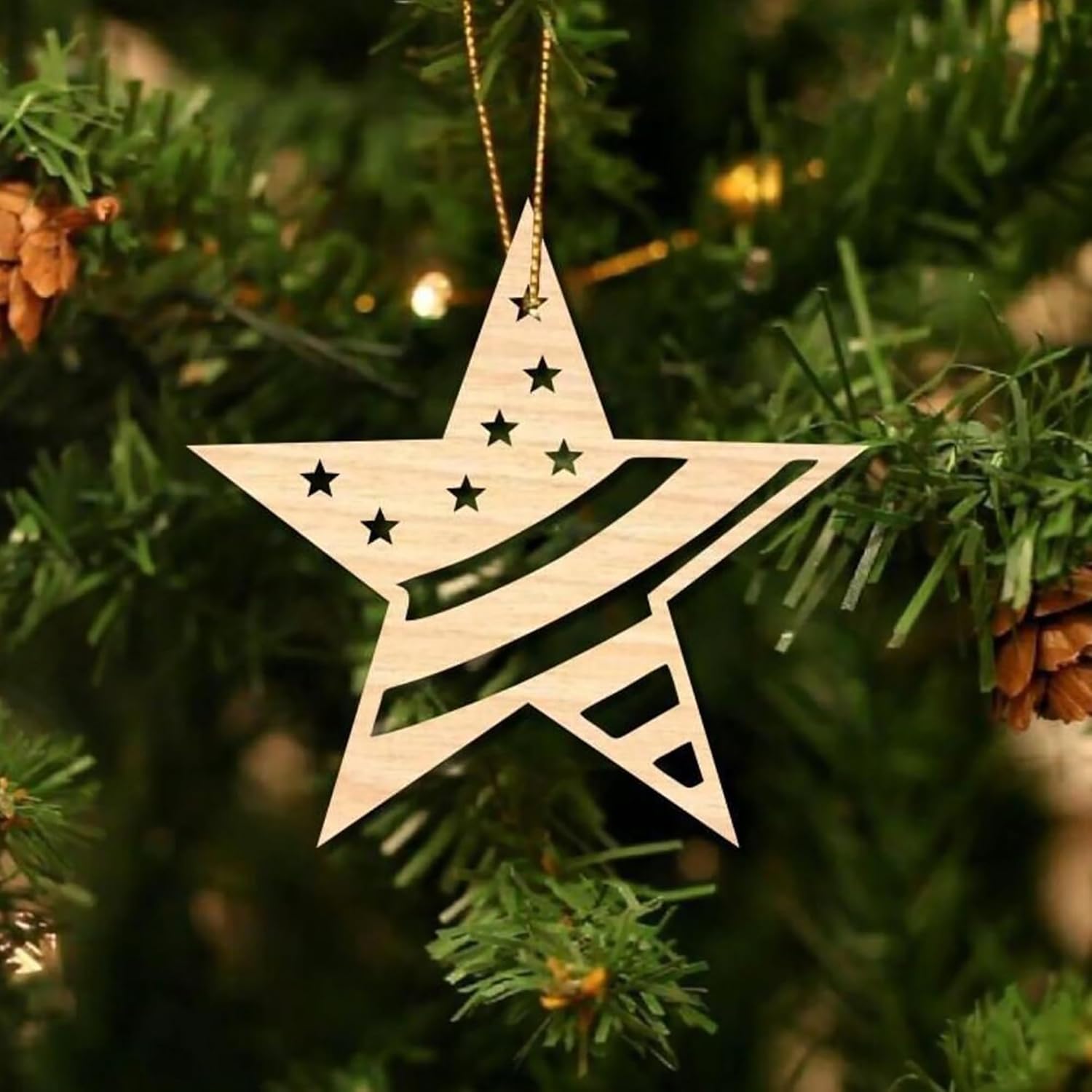 Wooden star-shaped ornament hanging on a Christmas tree