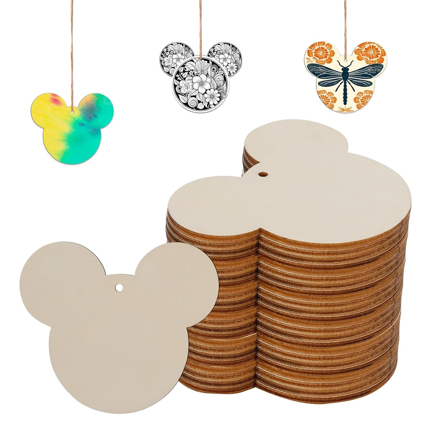 Stack of wooden tags shaped like Mickey Mouse ears with decorative tags above on a white background