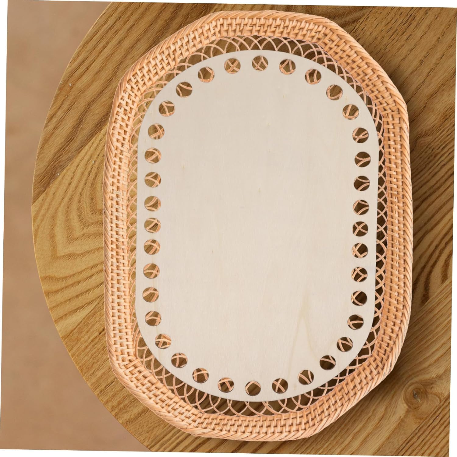 Woven placemat with cut-out design on a wooden surface