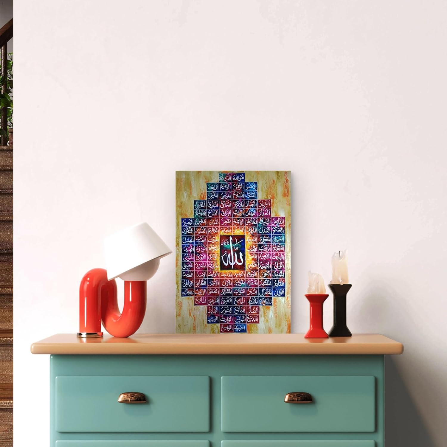 Decorative painting on a wall above a teal cabinet with colorful lamps.