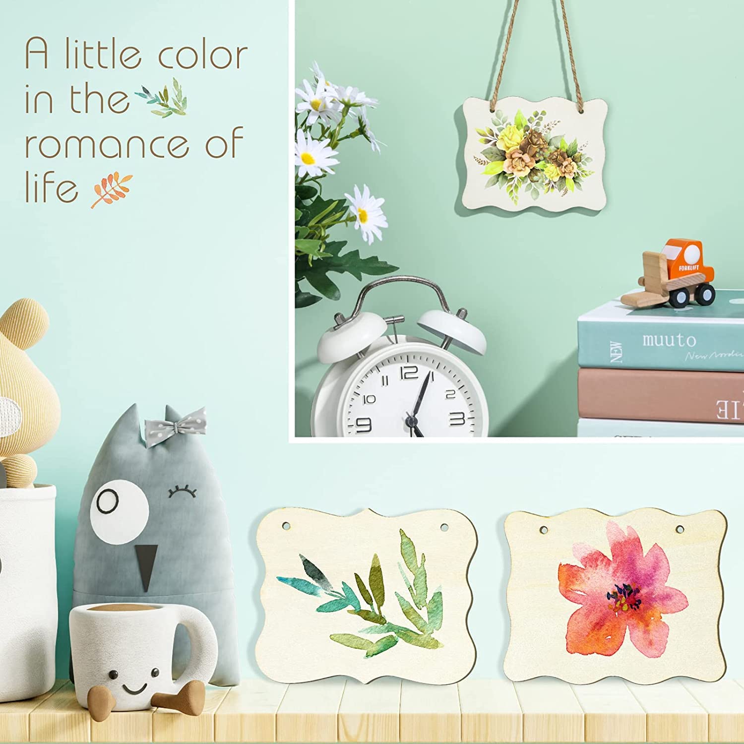 Decorative wall art with floral designs, books, alarm clock, and plush toys on a light green background.