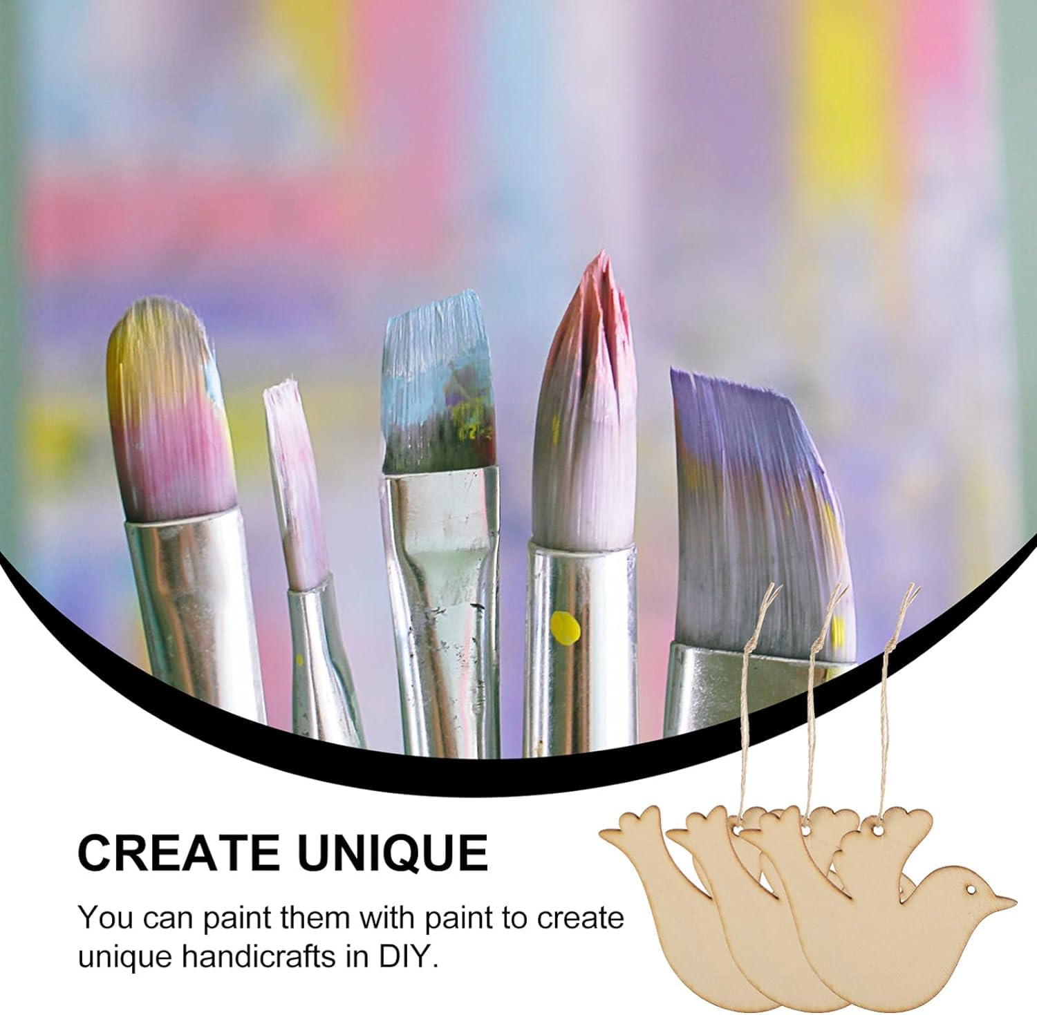 Set of paintbrushes with colorful bristles and wooden bird shapes on a blurred background.