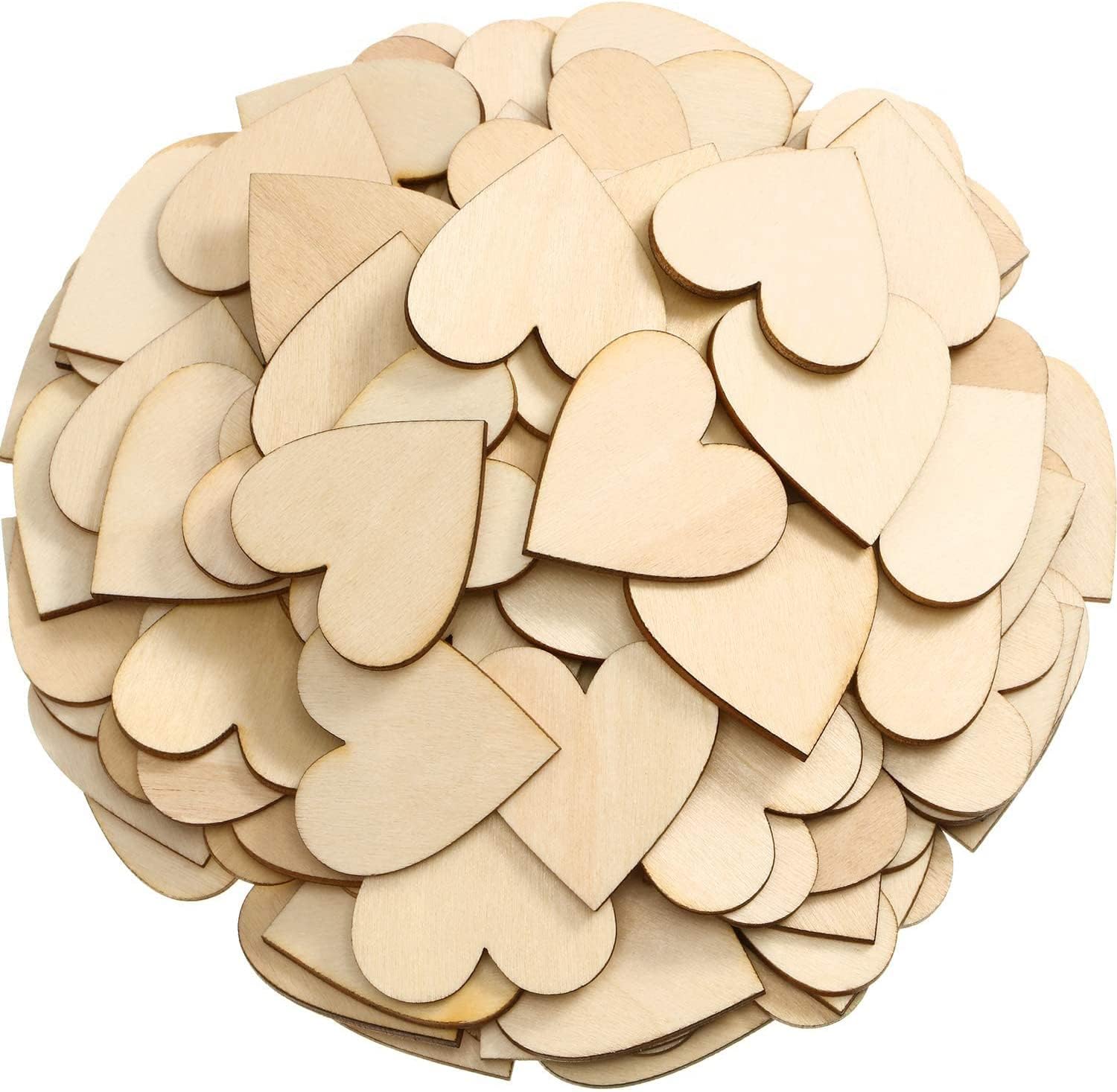 Stack of wooden heart shapes on a white background