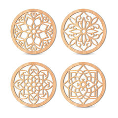 Four wooden coasters with intricate geometric patterns on a white background