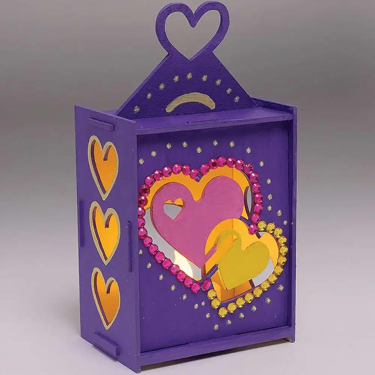 Purple decorative box with heart designs on a gray background