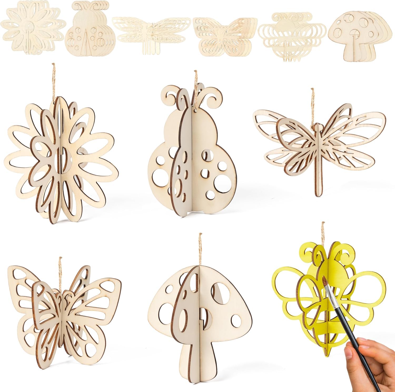 Set of wooden decorative items including butterflies, flowers, and mushrooms with a hand painting one item.