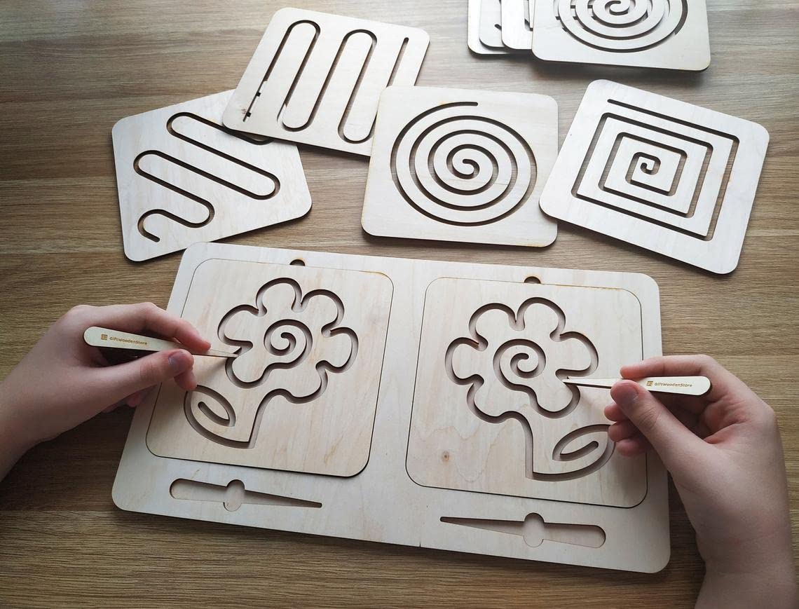 Wooden puzzle with cut-out patterns on a wooden surface