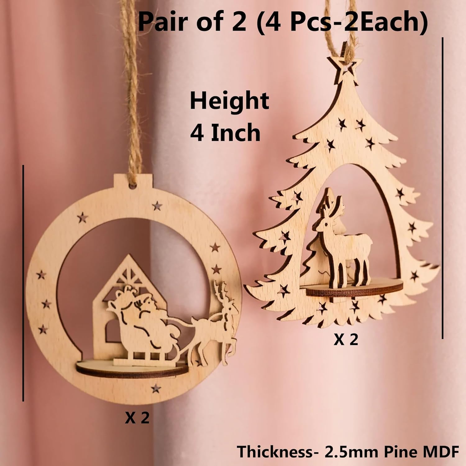 Two wooden Christmas tree ornaments with reindeer and star designs on a pink background.