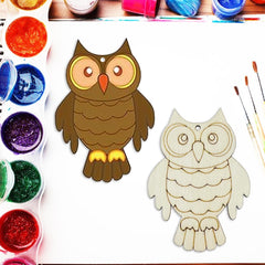 Two owl-shaped wooden cutouts with paint supplies on a white background