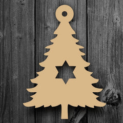 Wooden Christmas tree decoration with a star cutout on a wooden background
