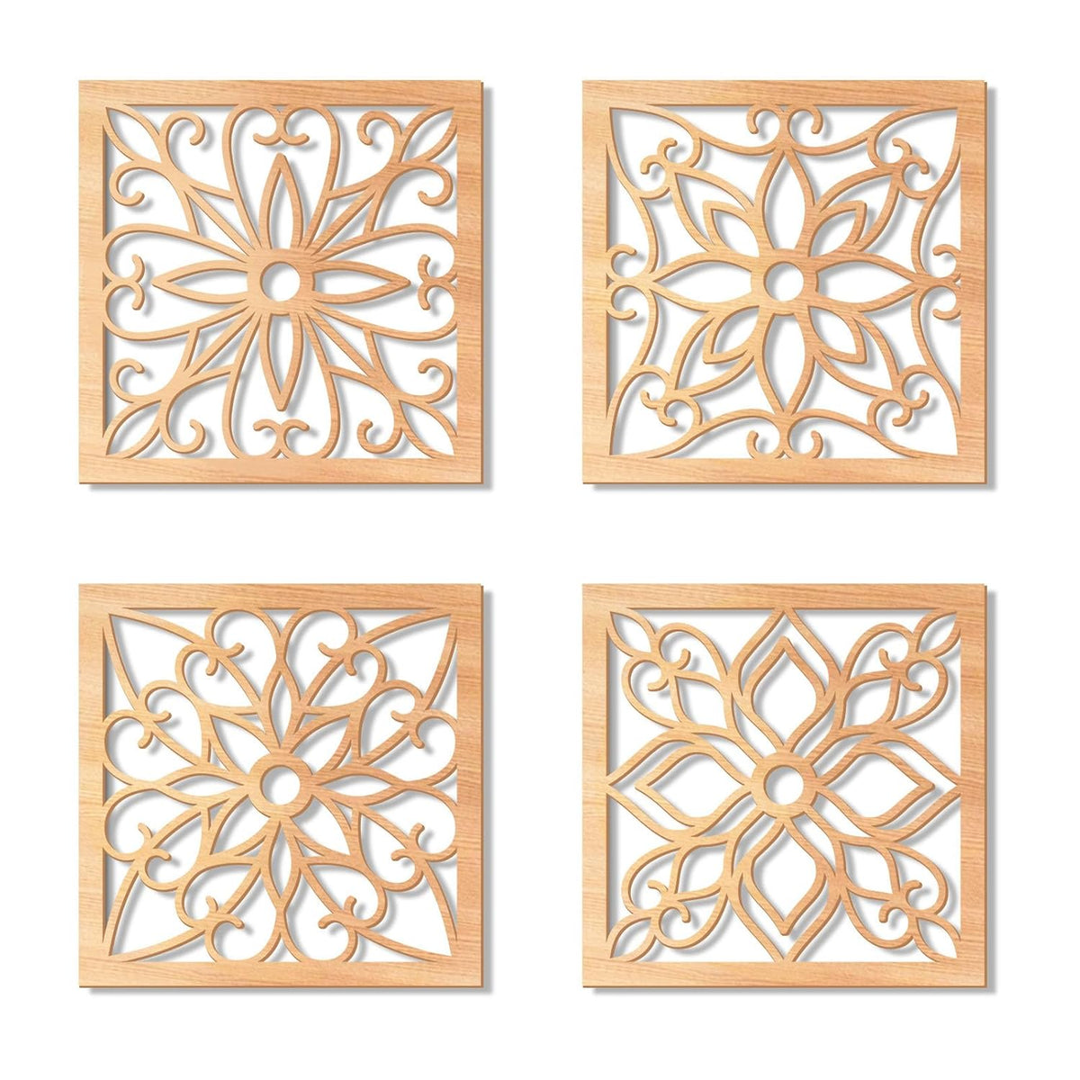 Four wooden decorative tiles with intricate cut-out patterns on a white background