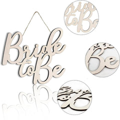 Wooden 'Bride to Be' sign with cut-out letters on a white background