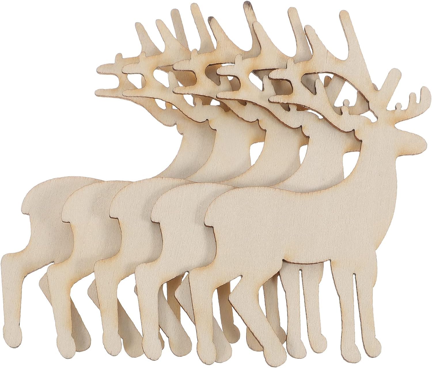 Set of wooden deer figurines with antlers on a white background