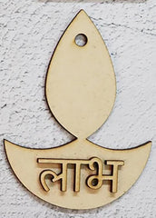Decorative brass pendant with 'ラabh' text on a textured white background