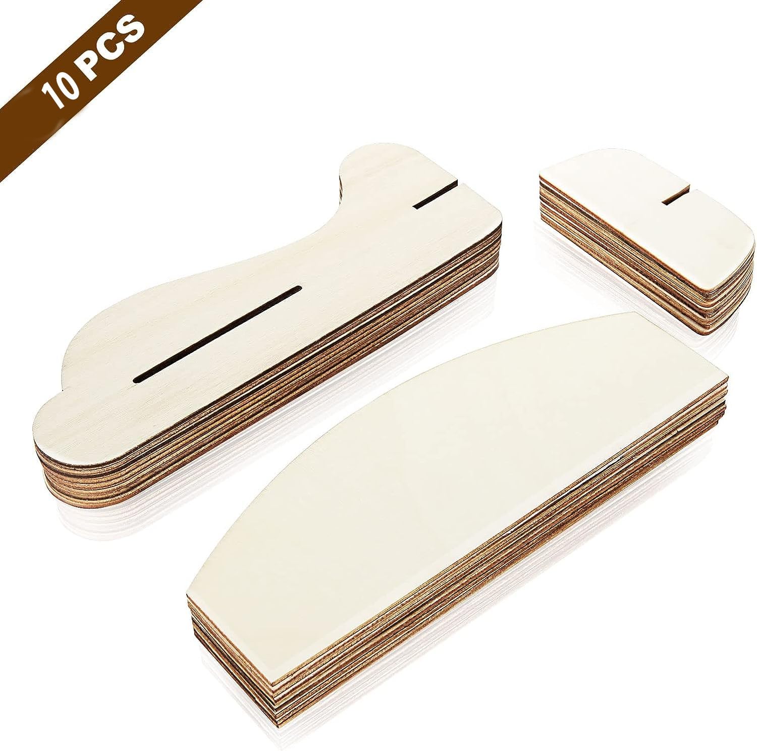 Set of wooden guitar bridge saddles with a white background