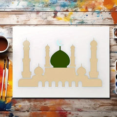 Artistic depiction of a mosque with a green dome on a white background, surrounded by art supplies.