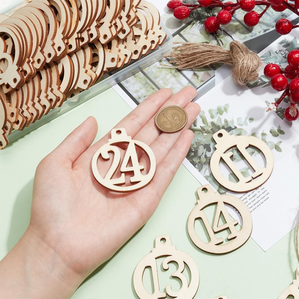 Wooden Christmas ornaments with numbers held in a hand, surrounded by festive decorations.