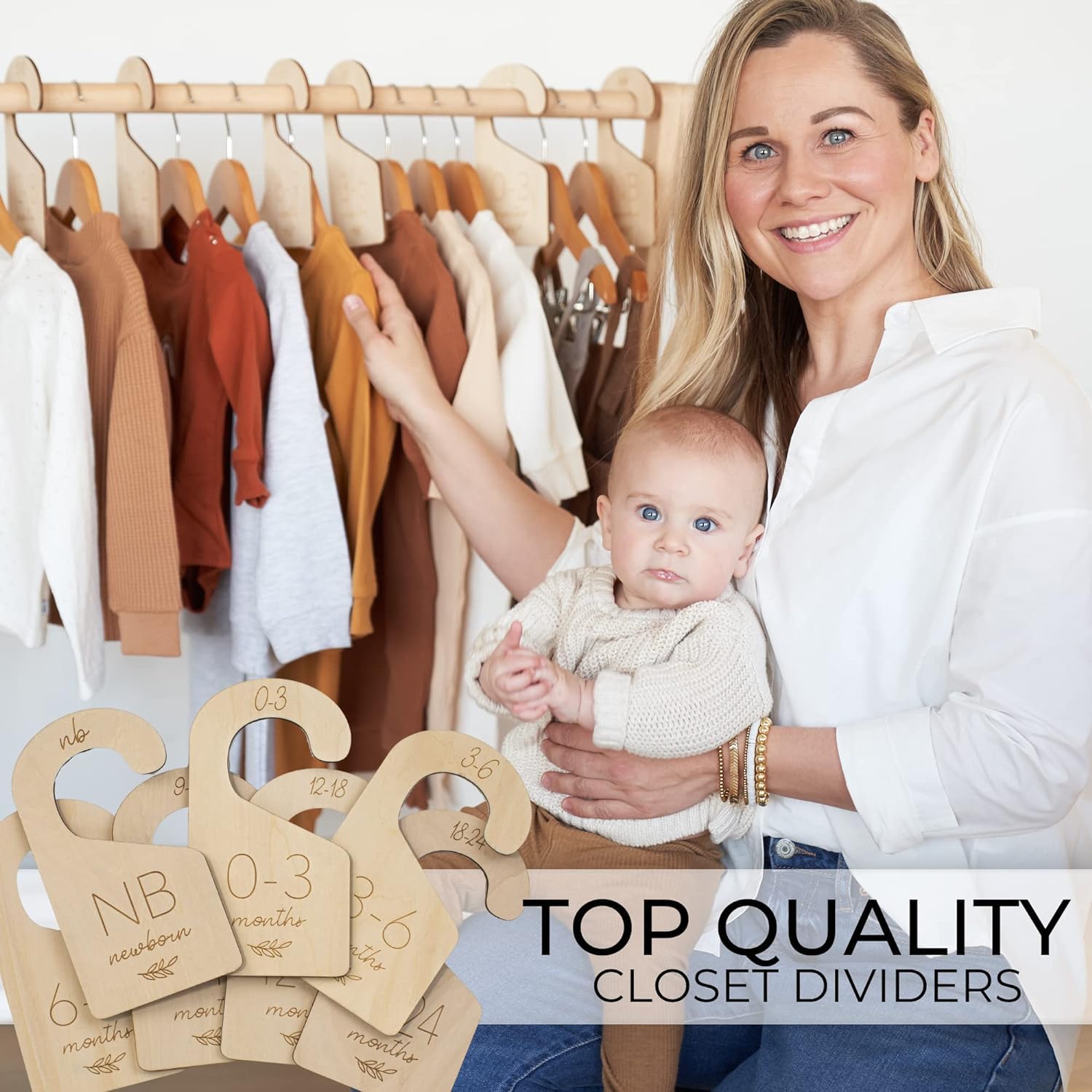 Woman holding a baby with closet dividers and clothes in the background