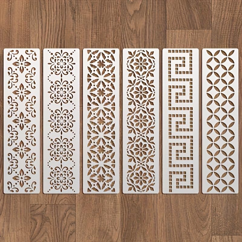 Set of six decorative wall panels with intricate patterns on a wooden floor.