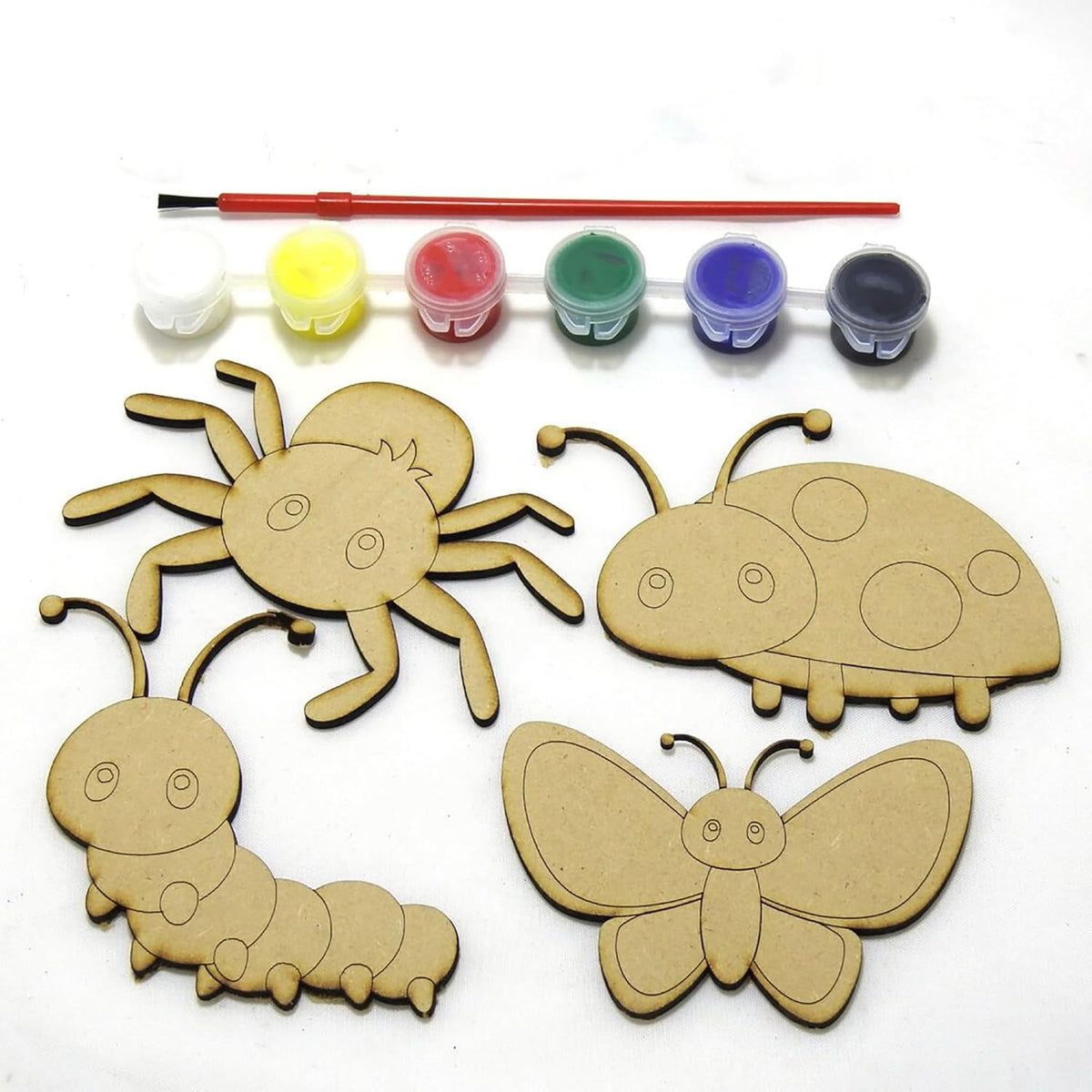 Wooden insect shapes with paint bottles and a brush on a white background