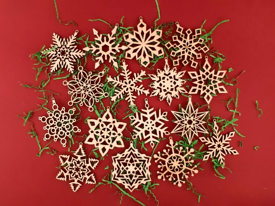 Wooden snowflake ornaments on a red background