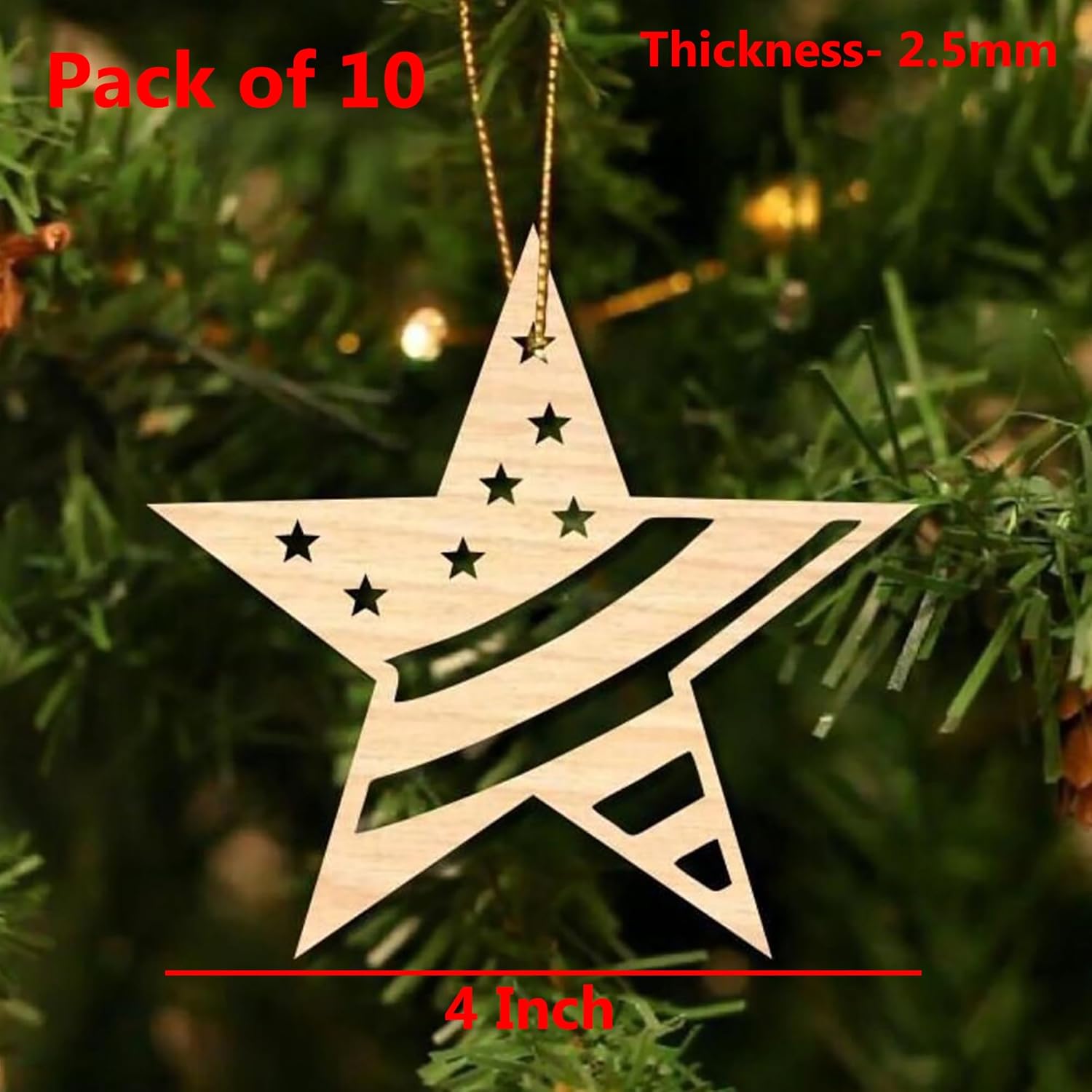 Wooden star ornament with cut-out design hanging on a Christmas tree.