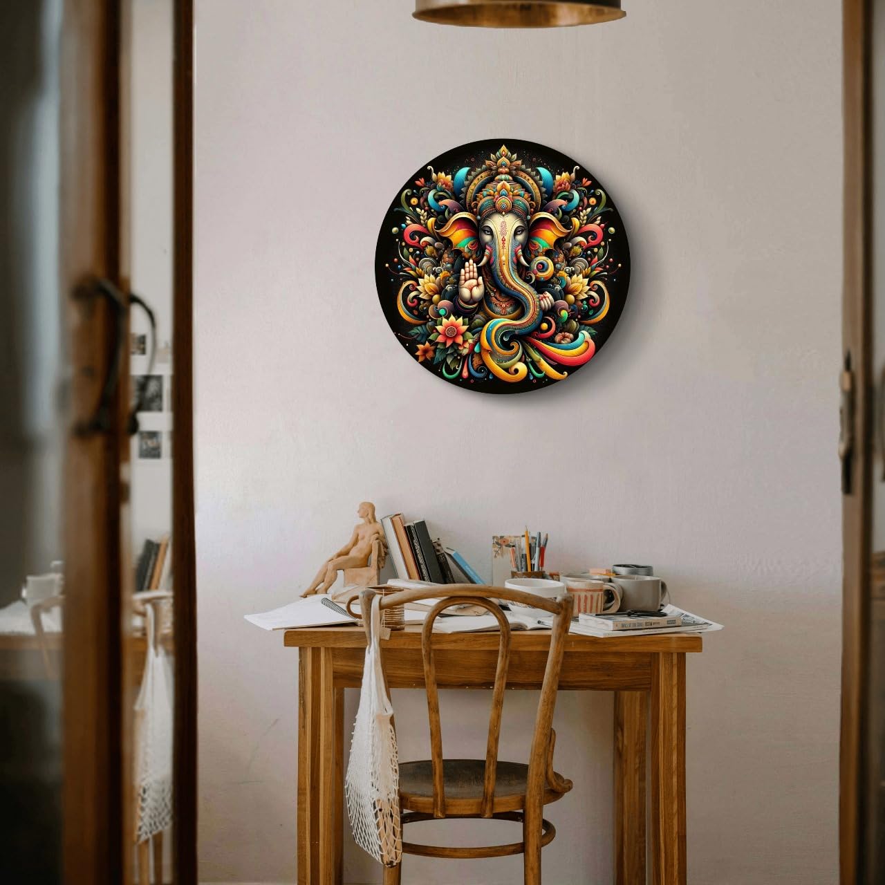 Decorative wall clock with colorful design on a wall above a wooden table.