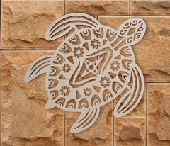 Decorative turtle design on a stone wall