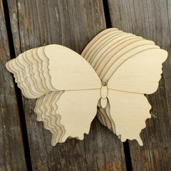 Wooden butterfly decoration on a wooden background