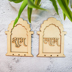 Two wooden decorative pieces with script on a light gray background