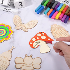 Wooden craft shapes with colorful markers on a table