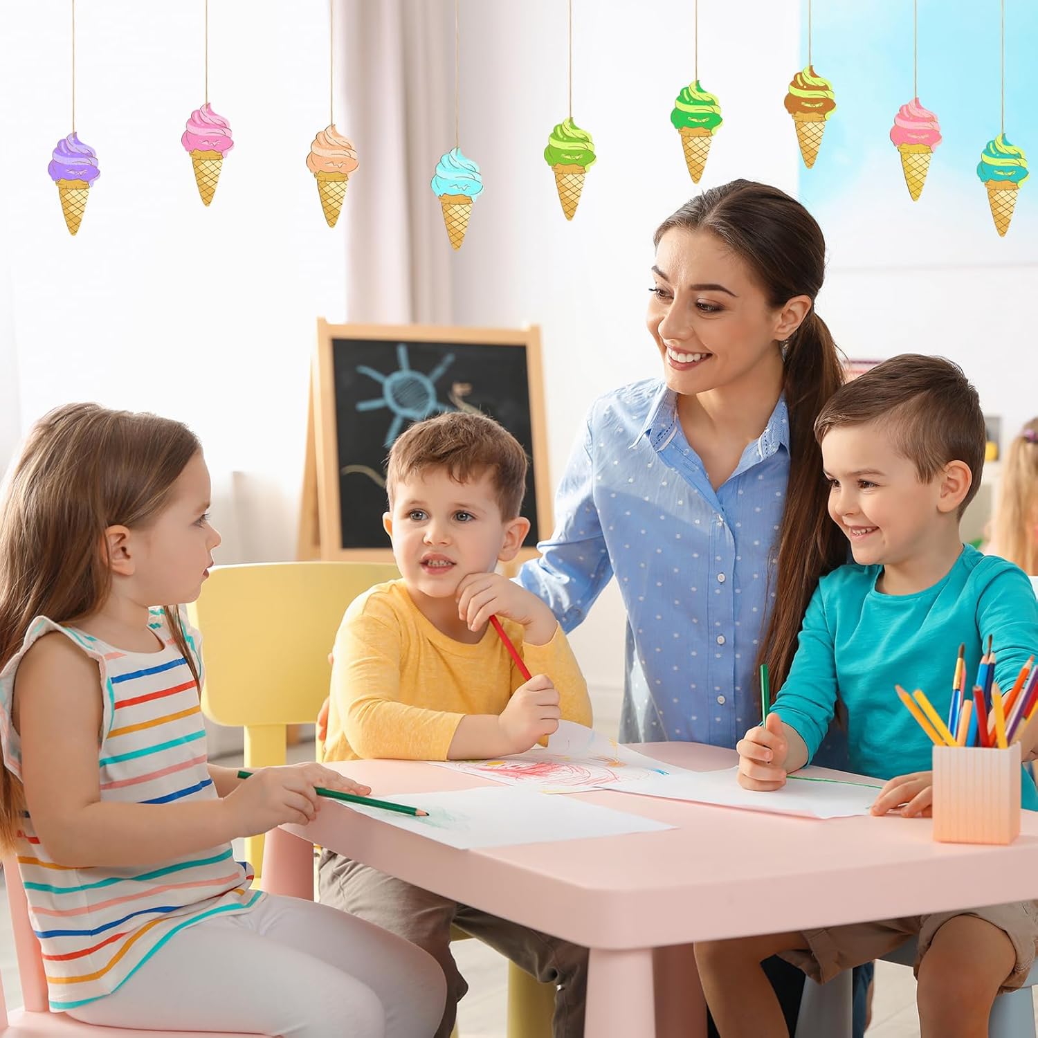 Teacher and students in a classroom setting with colorful ice cream decorations.