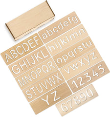 Set of wooden letter and number stamps on a white background