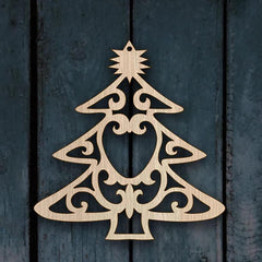 Decorative wooden Christmas tree ornament on a dark wooden background