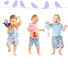 Three children playing with bird-shaped toys against a white background