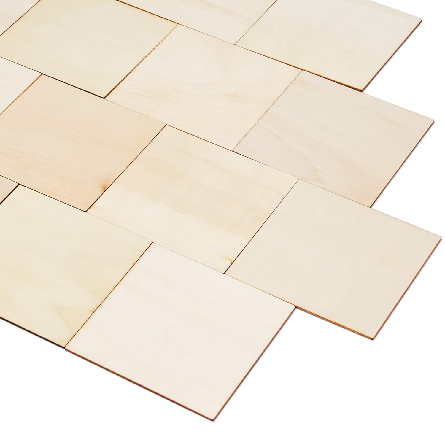 Beige ceramic tiles arranged in a herringbone pattern on a white background