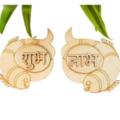 Wooden ornaments with engraved text on a white background
