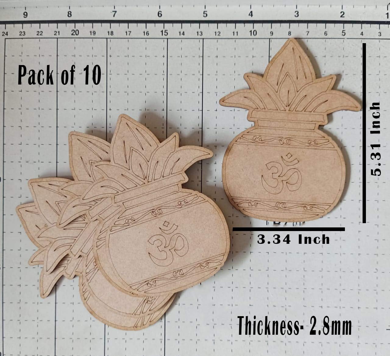 Two wooden pineapple-shaped decorations with Om symbol on a white grid background with measurements.