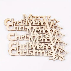 Wooden 'Merry Christmas' decorations on a white background