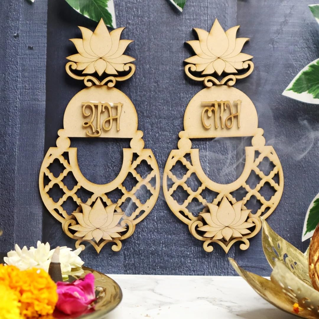 Decorative earrings with intricate designs and text on a dark background