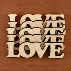 Wooden letters spelling 'LOVE' on a wooden background