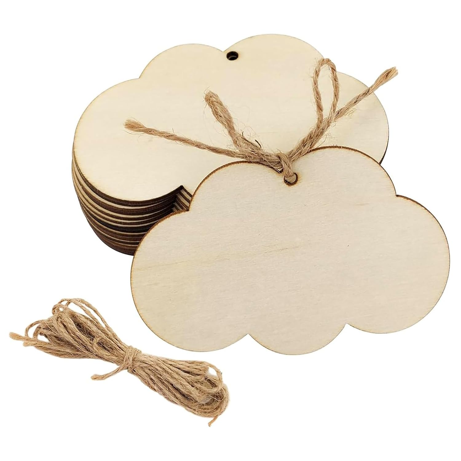 Set of cloud-shaped wooden tags with twine on a white background