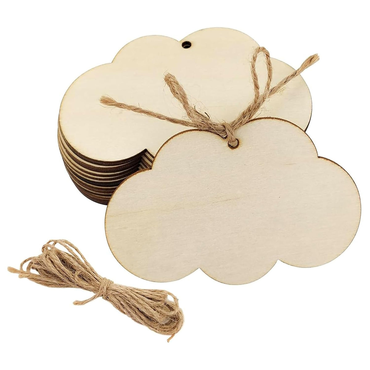 Set of cloud-shaped wooden tags with twine on a white background