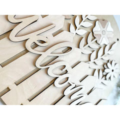 Wooden letters and floral shapes on a white background