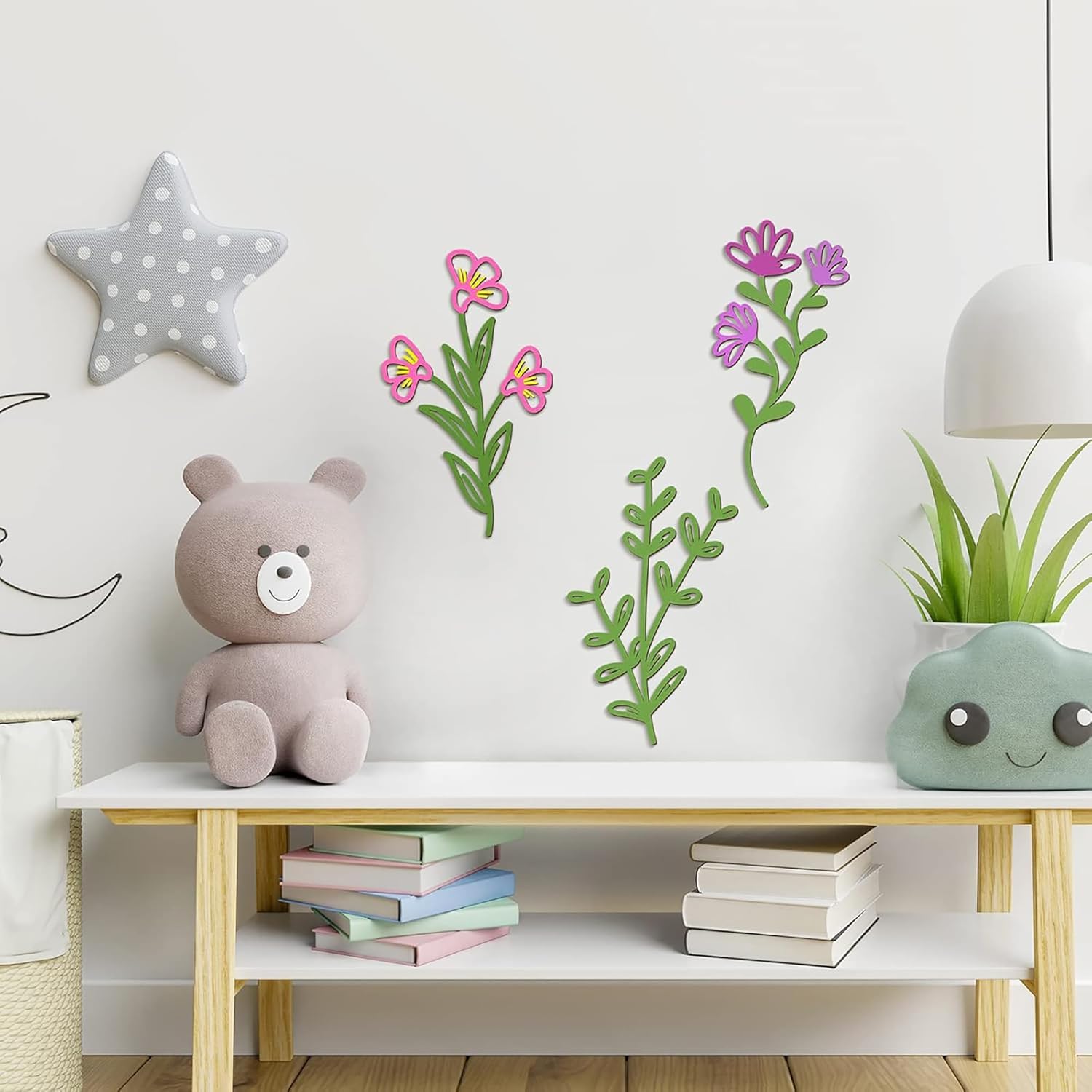 Children's room with a teddy bear, books, and decorative plants on a shelf.