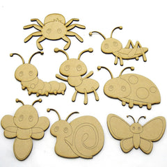 Set of wooden insect shapes on a white background