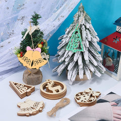Collection of wooden Christmas ornaments on a snowy background